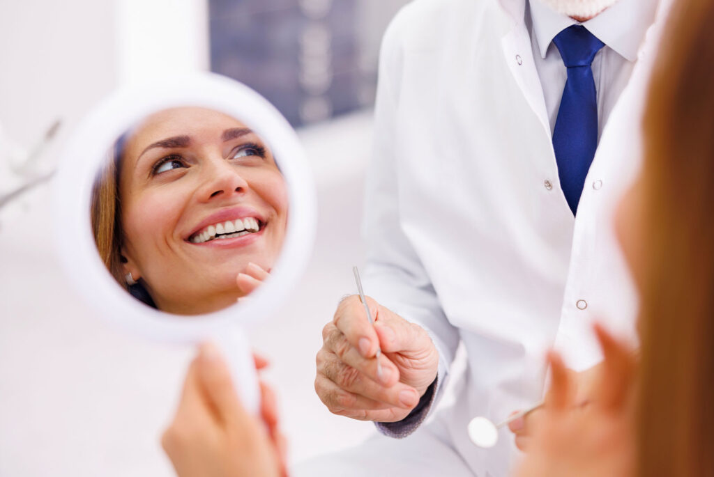 Dentist and patient at dental clinic